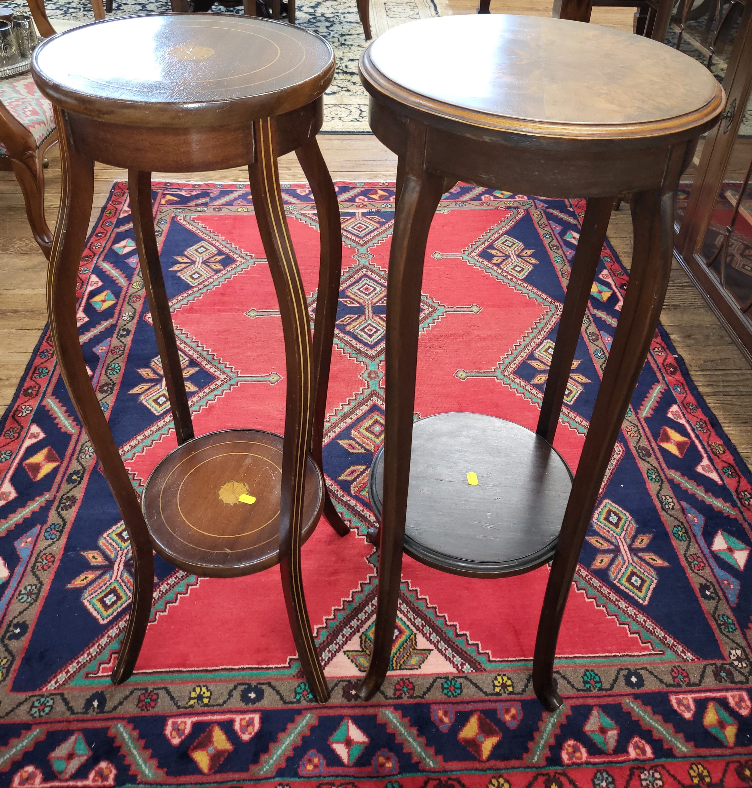 An Edwardian inlaid plant stand, together with a Victorian mahogany plant stand (94cm x 37cm and