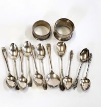 A group of silver spoons, together with two silver napkin rings. (qty)