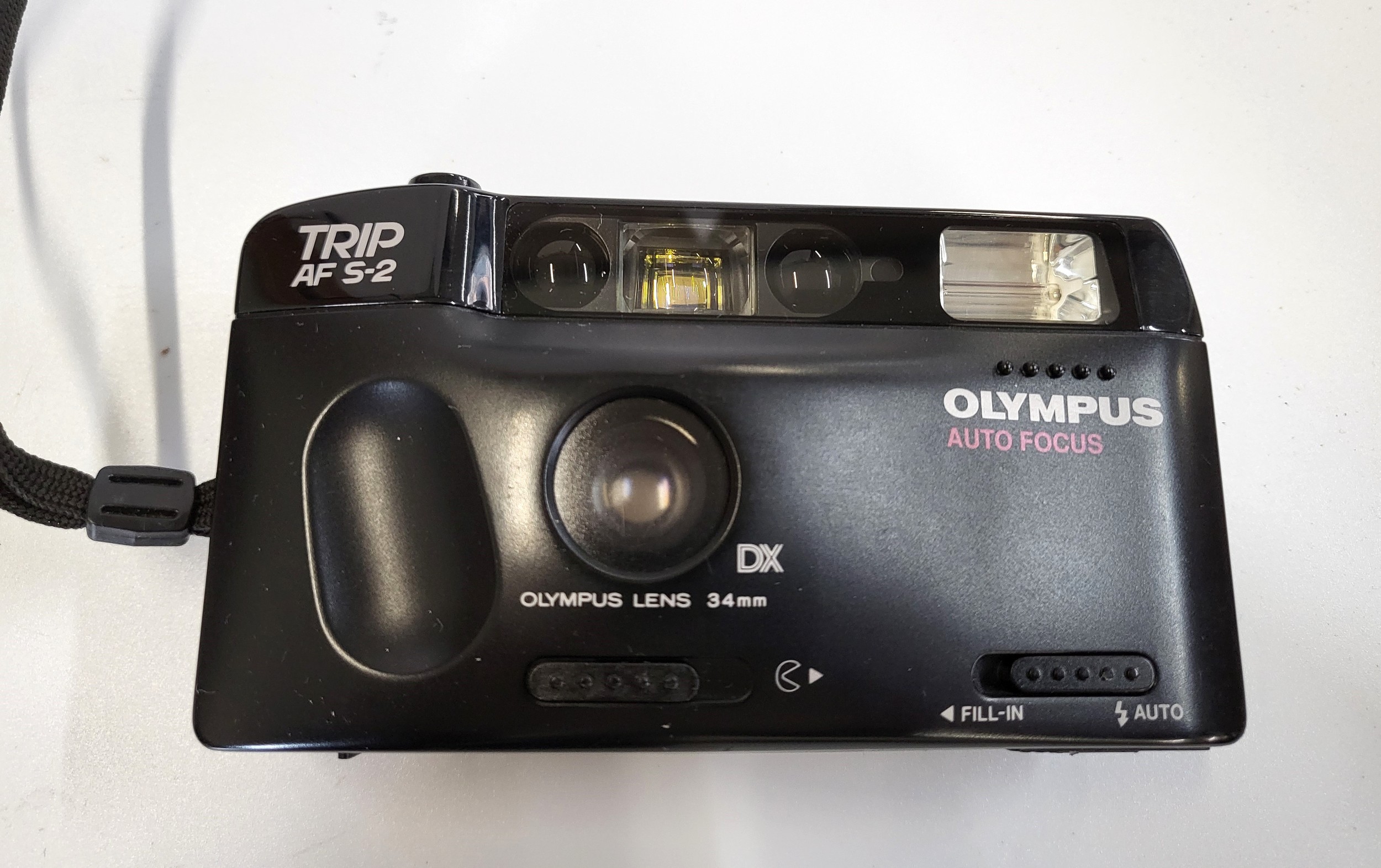 Three SLR cameras, Pentax ME Super and a Praktina, a Z008 digital camera, and an Olympus Trip. A - Image 8 of 8