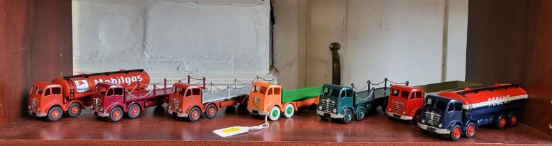 Seven Dinky Toys Foden 2nd Type Lorries including Regent and Mobilgas Tankers, all repainted. (7)