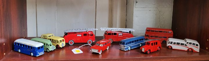 Eleven Dinky Toys commercials inlcluding Commer Fire Engine and B.O.A.C. Coach, all repainted. (10)