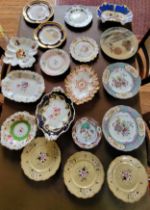 Eighteen plates and dishes including Spode, Royal Doulton Davenport, Royal Crown Derby, and a