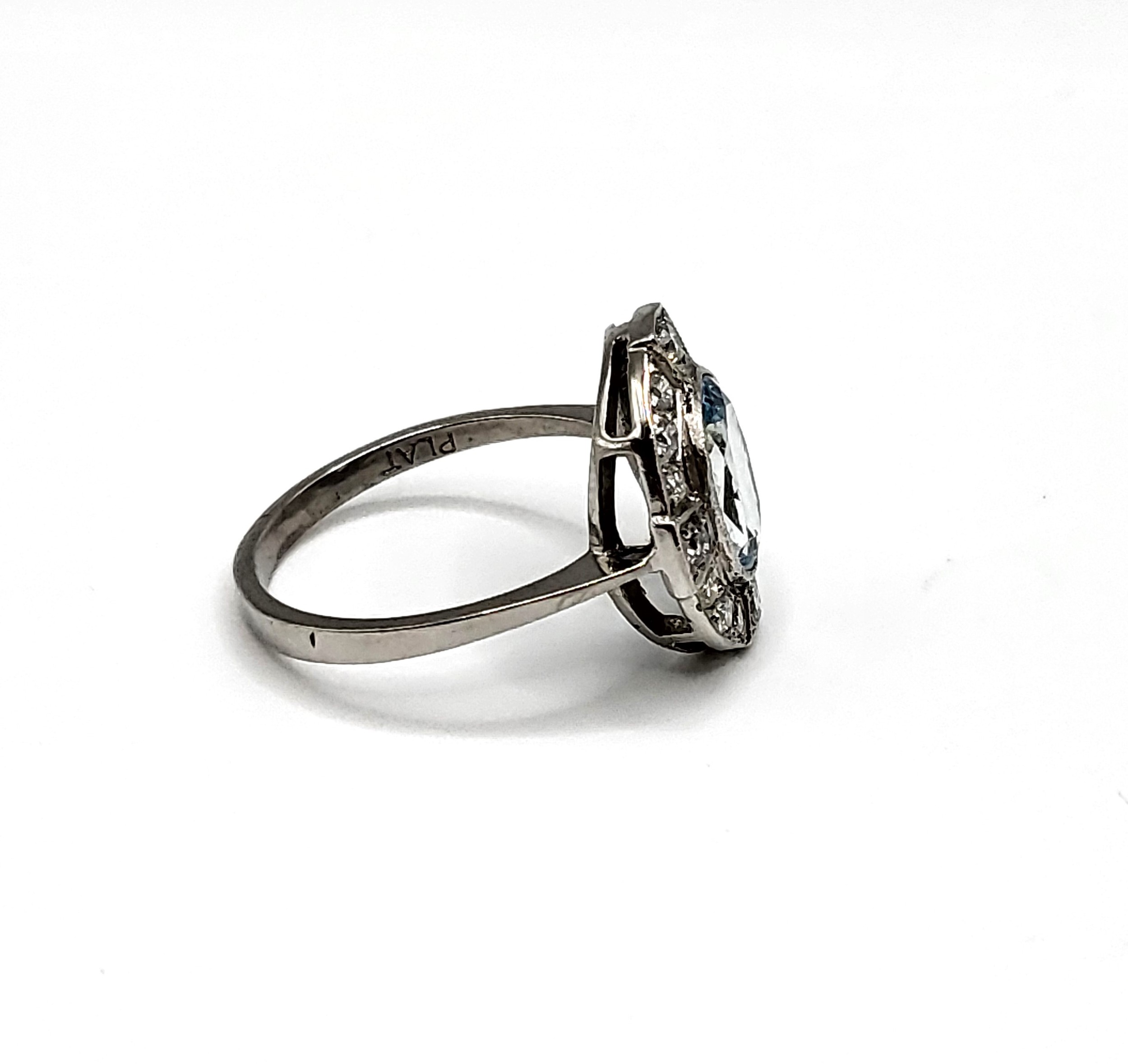 A platinum, diamond, and aquamarine ring, set with a mixed oval-cut aquamarine of approximately 1.50 - Image 4 of 5