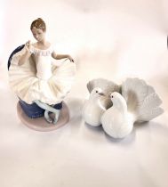 Lladro pair of doves, 21cm, and Nao seated dancer, 25cm. (2)