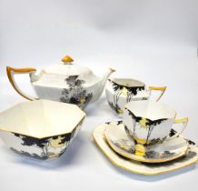 A Shelley porcelain 11678 'Rising Sun' pattern, 1929, tea set comprising of tea pot (slight fracture