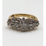 An 18ct yellow gold and diamond ring, centred with a kite shaped cluster of round brilliant-cut