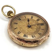 An 18ct yellow gold Victorian fob watch, with engraved gilt dial and enamel Roman numeral markers,