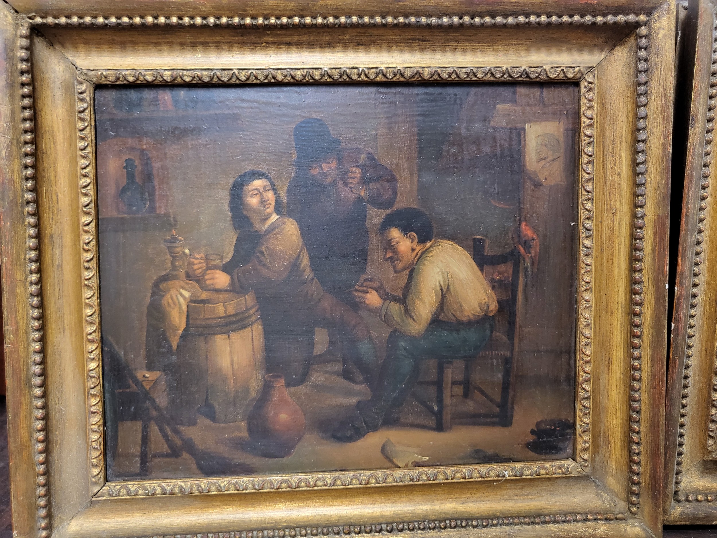 A pair of late 19th century paintings depicting tavern interior scenes, oil on board, in giltwood - Image 2 of 3