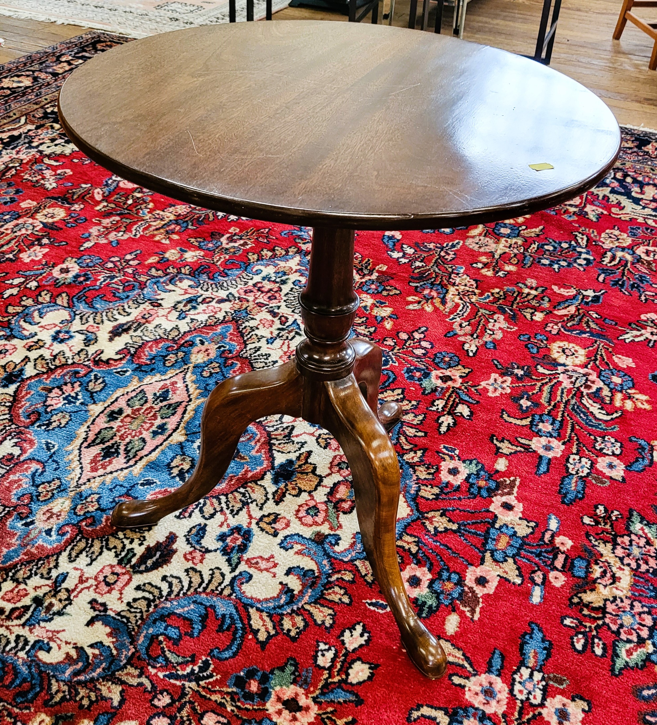 A beautiful mahogany tripod table. 70cm x 56cm