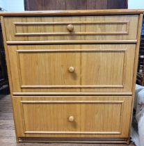 A lockable office chest of three drawers, (light wood). Comes with keys. 80cm x 76cm x 50cm.