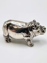 A novelty silver figure of a hippo. 2cm x 4cm.