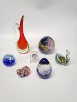 Glass ornaments including Mdina-style paperweight, Swan, cat, and an Edinburgh Crystal clock. (7)