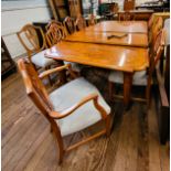 A large burred yew dining table, 75cm x 230cm x 120cm (two extending leaves measuring 48cm x 120cm