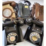 Five telephones comprising of two 1930's Bakelite, a two tone grey from 1960's, a 1970's
