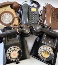 Five telephones comprising of two 1930's Bakelite, a two tone grey from 1960's, a 1970's