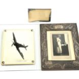 A collection of three photo frames; two Art Deco and the other, a silver Art Nouveau.