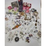 A box of costume jewellery, to include various silver and white metal rings, beaded necklaces,