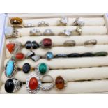 A group of twenty-three various silver rings, set with cubic zirconia, amber, moonstone, coral,