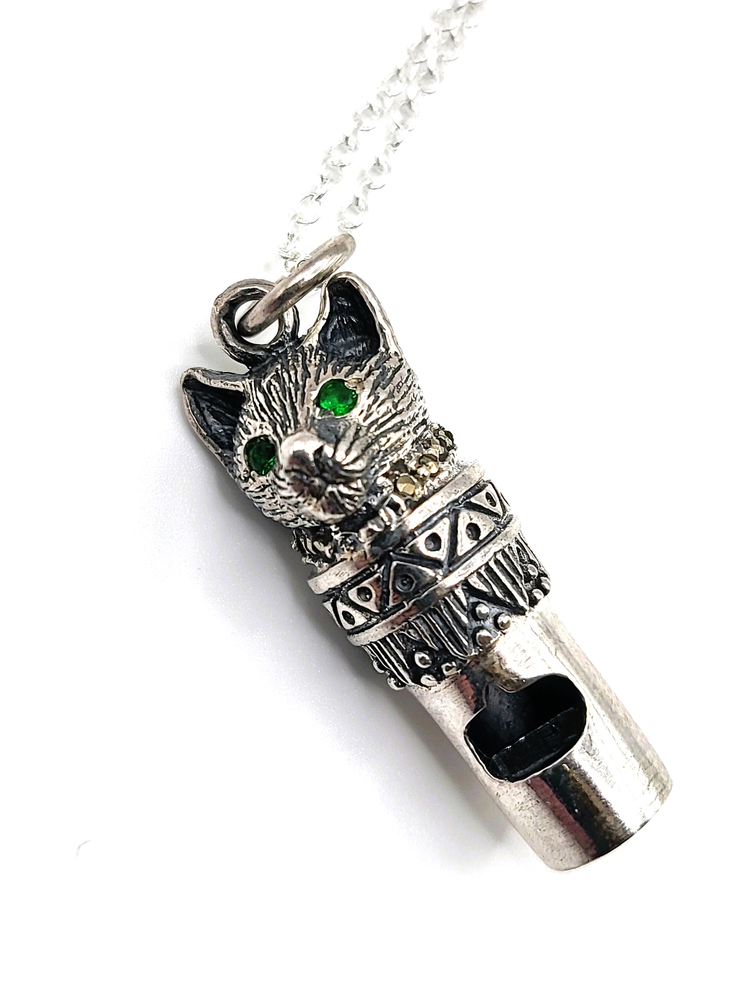 A novelty silver pendant whistle in the form of a cat, suspended on a silver chain. 3.2cm - Image 2 of 3