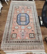 A pale pink, cream and pale blue ground rug, multi bordered and fringed. 15 x 250 cm.