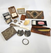 An eclectic mix including two mid-century travel alarms (an Oris and a Swiza), a feathered purse,
