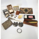 An eclectic mix including two mid-century travel alarms (an Oris and a Swiza), a feathered purse,