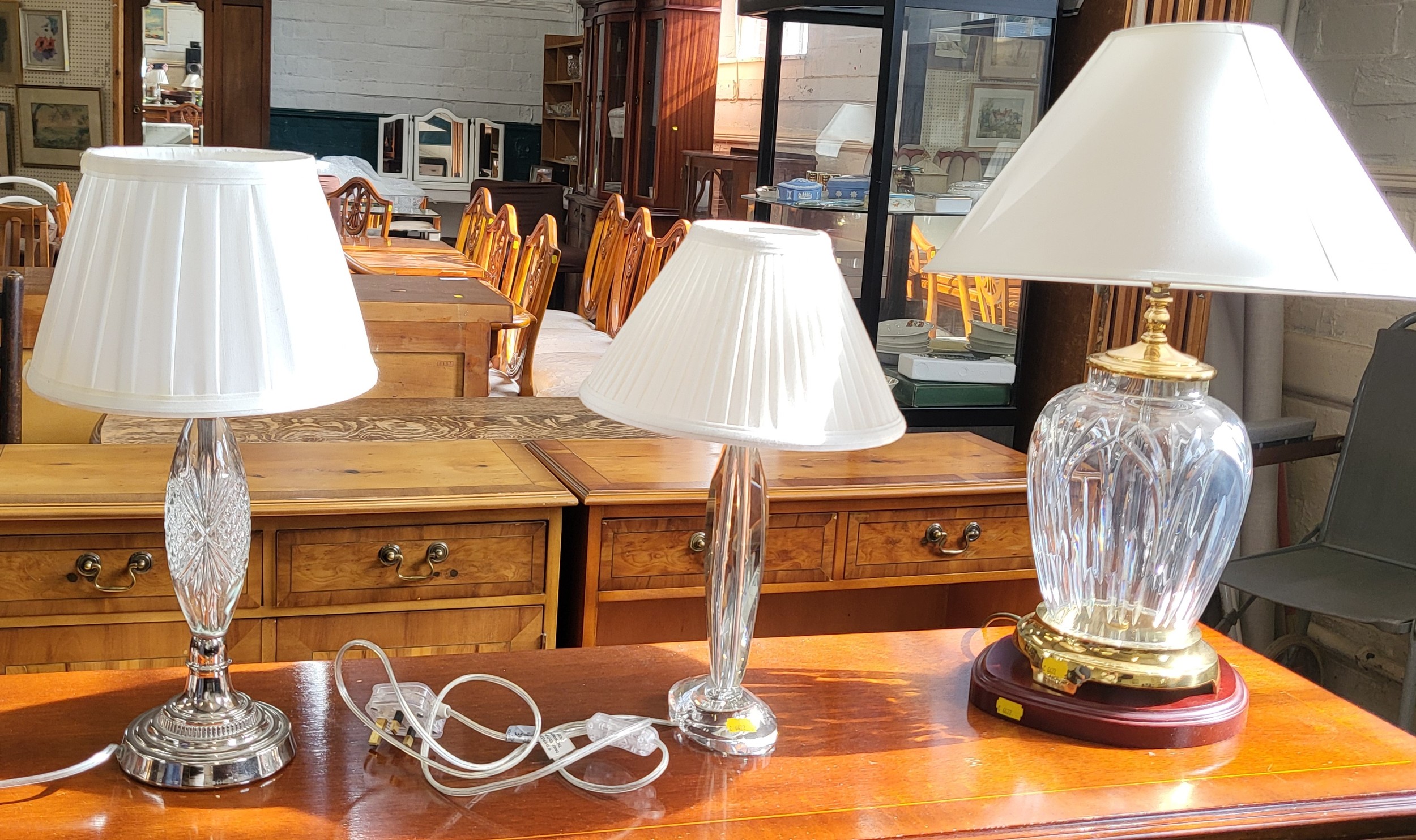 A Waterford Crystal Ballylee table lamp with wood stand, 56cm, a T.J.X glass table lamp, 46cm, and a