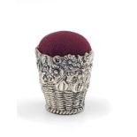 A silver bucket pincushion in the form of a bouquet of flowers. 3.2cm