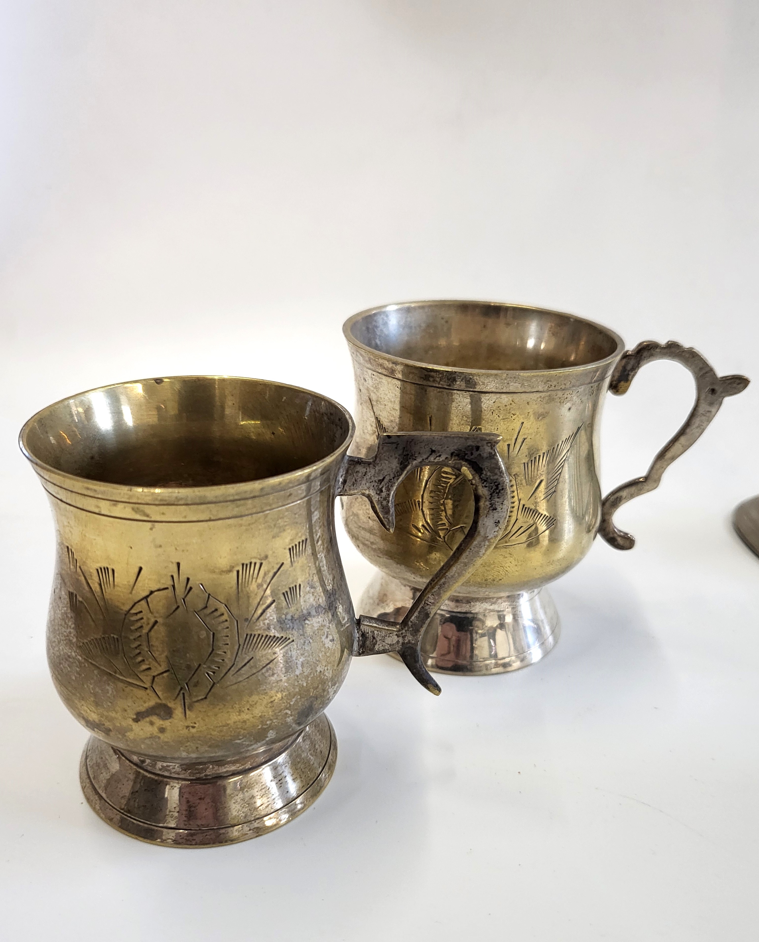 A group of silver plated items, including two mugs, a toast rack, a posy stem vase, and a white - Image 2 of 5