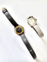 A ladies longines in stainless steel on an expandable bracelet and a Gucci ladies quartz movement on