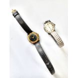 A ladies longines in stainless steel on an expandable bracelet and a Gucci ladies quartz movement on