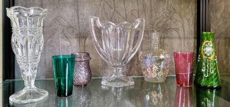 A glass campana vase with twin handles and hexagonal foot, 20.5cm, one emereald green and one