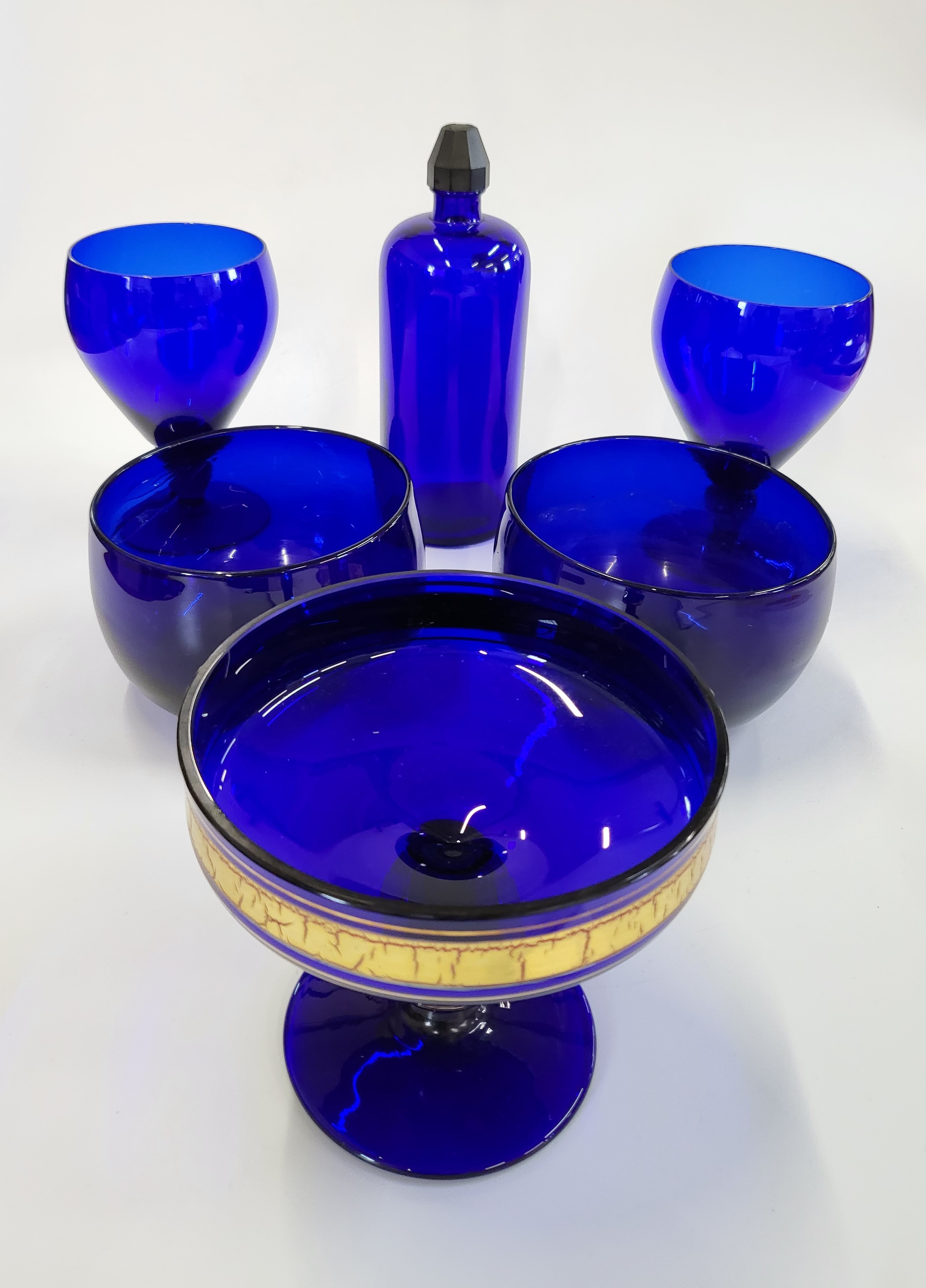 Two Bristol Blue glass finger bowls, 12.5cm diameter, pair of blue rummers, tazza and a bottle. (6)