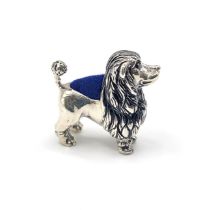 A novelty silver pin cushion in the form of a poodle. 2.6cm h 2.7cm w