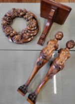 A pair of late 19th / early 20th century wooden caryatid figural carvings, together with an