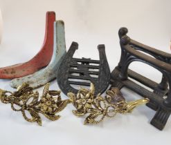 A collection of brass and metalware including fire tools, an iron, a coal scuttle, door stops,