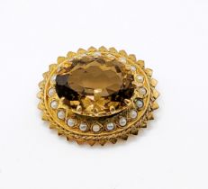 A 9ct yellow gold, smoky quartz, and pearl Victorian style brooch, of oval design, set with a