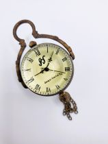 A brass and glass desk ball clock.