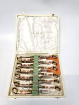 Set of Royal Crown Derby cutlery- six knives and six forks in fitted case.