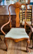 A 19th century Queen Anne style walnut inlaid chair, with splatted back, curved arms, and