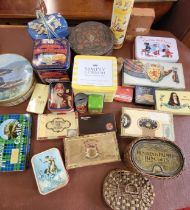 A collection of biscuit tins including a Huntley & Palmer wicker basket.