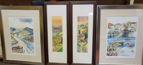 Two colourful seaside town prints, in silver coloured wooden frames (46cm x 35cm), together with two