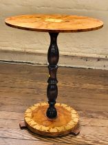 A late 20th century circular marquetry occasional table on a turned pedestal. 62cm x 52cm.