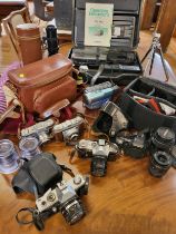 Group of cameras and video recorder including a Praktica LTL film camera and a Pentalon 2.8/28mm