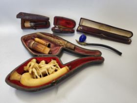 A group of pipes and cheroot holders