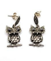 A pair of silver and marcasite owl earrings. Approx 3cm.