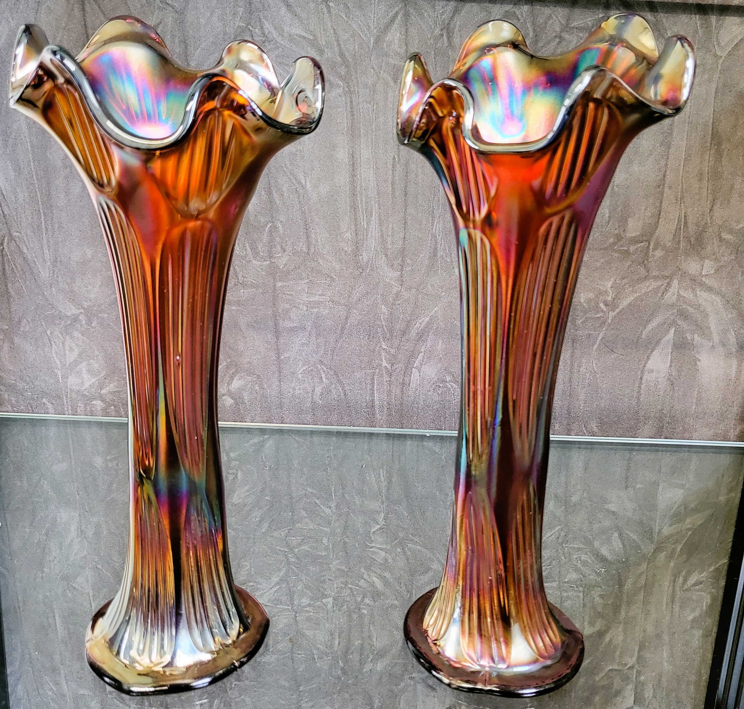 A pair of carnival glass iridescent Jack-in-the-Pulpit vases, 29cm. (2)