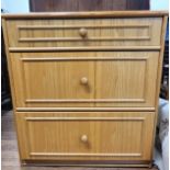 A lockable office chest of three drawers, (light wood). Comes with keys. 80cm x 76cm x 50cm.