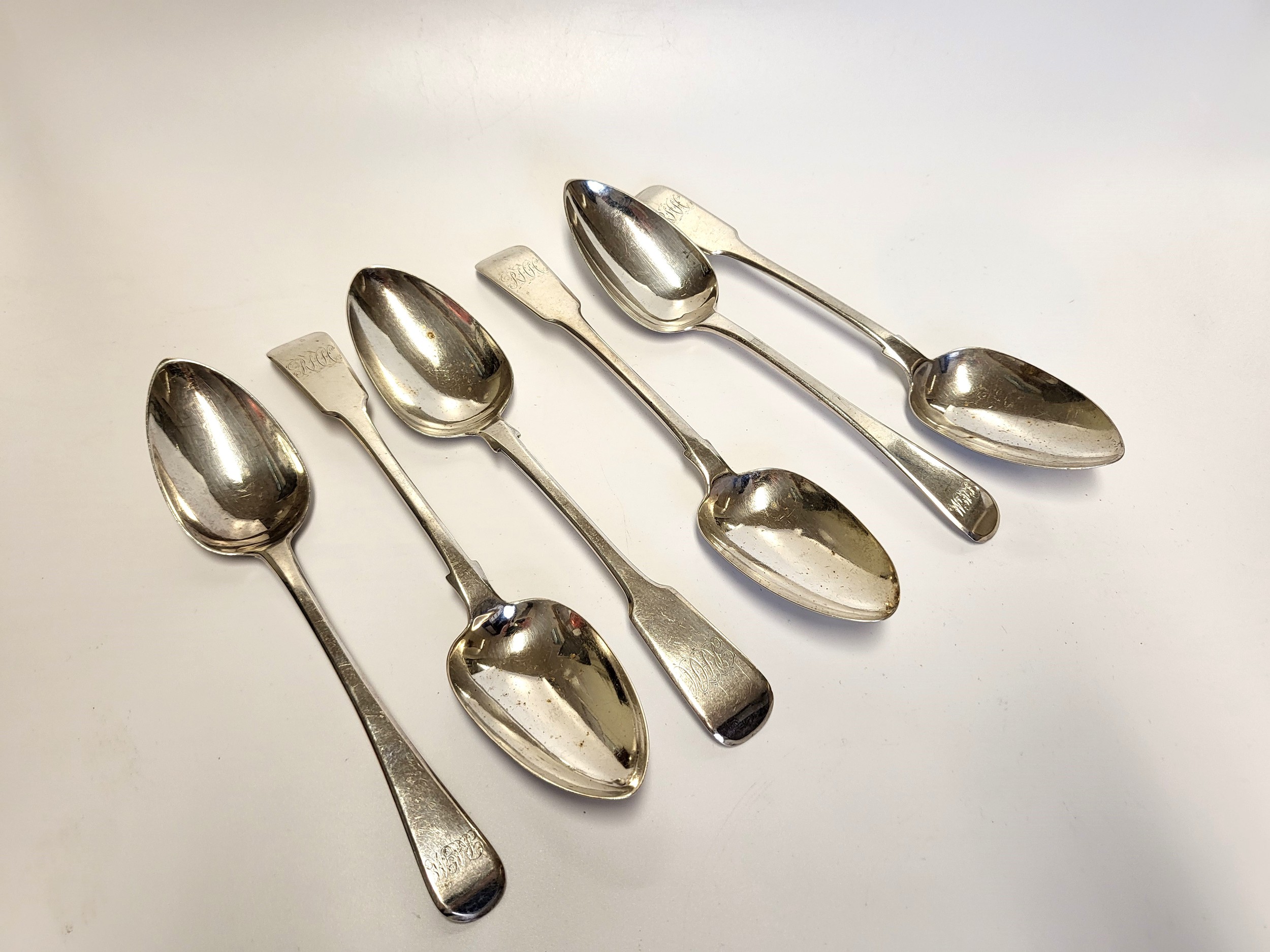 A set of six Georgian silver serving spoons, bearing London hallmarks, makers mark indistinct, of