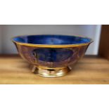 An Atkinson-Jones blue-glazed lustreware footed bowl, with painted craquelure design to interior and